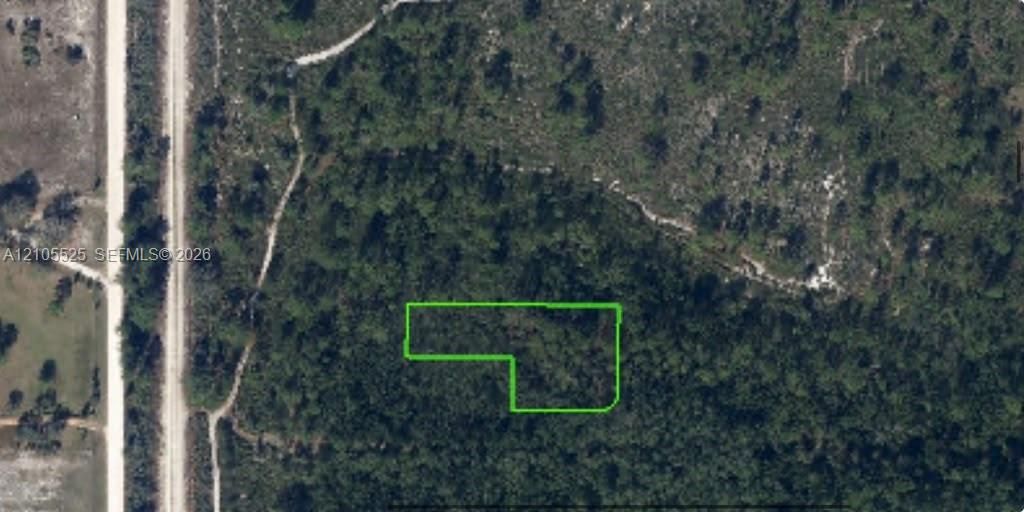 Aerial Parcel Map. Highlighting the surveyed boundaries of the property