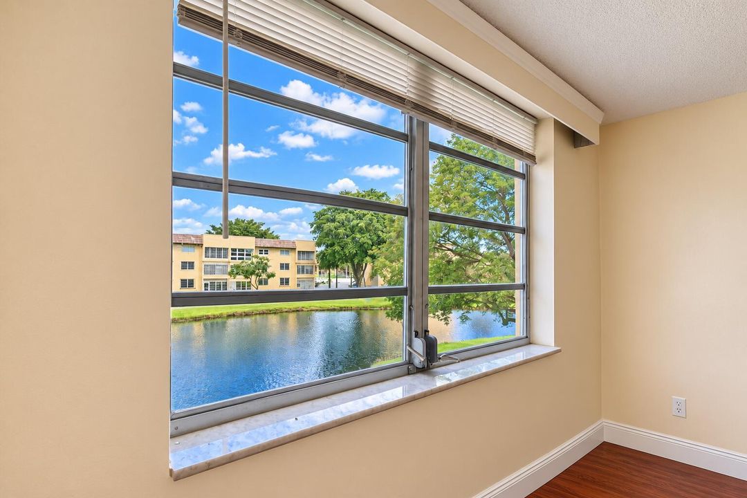 Bright Room with Lakeside Window View