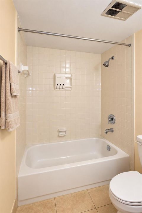 Clean Spa-Like Bathroom with Tiled Tubal