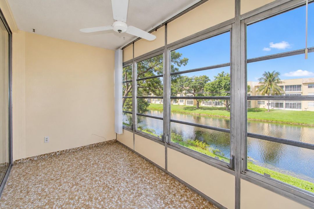 Bright Empty Sunroom Overlooking the Can