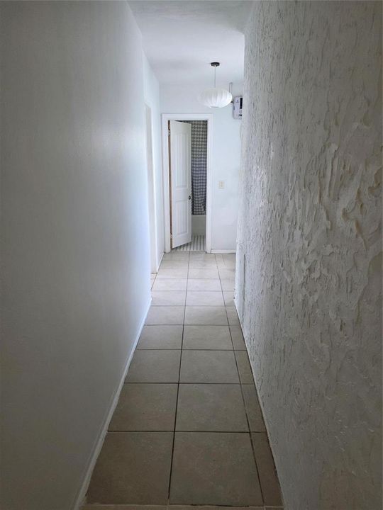 Hallway to bedrooms and bathroom