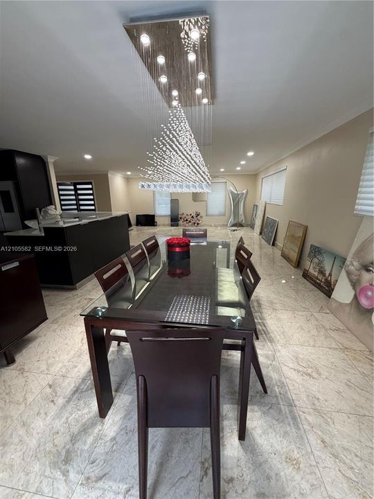 Polished marble-look flooring extending throughout