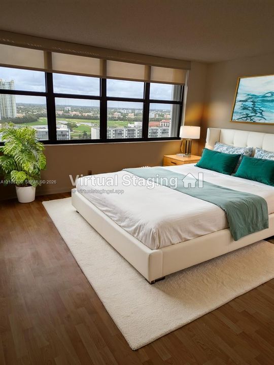 Floor-to-ceiling windows featuring panoramic urban scenery, wood-finish flooring, and integrated roller shades