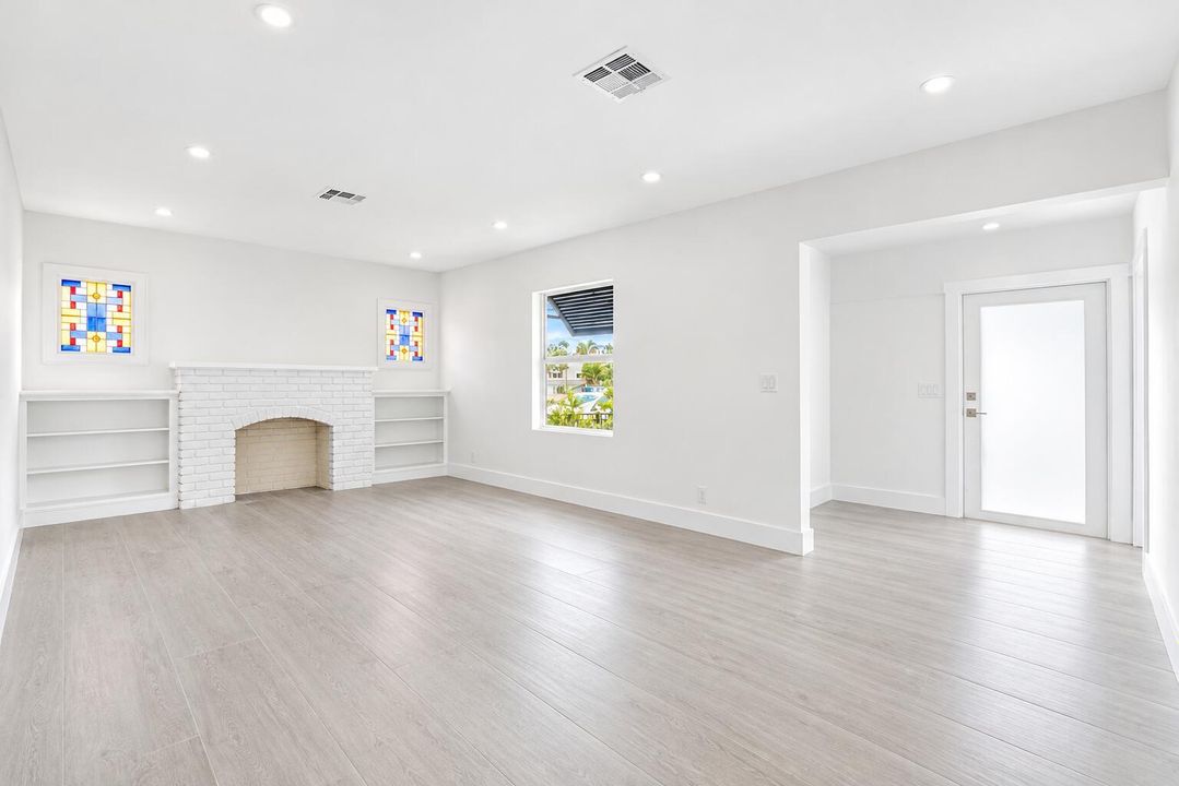 Bright White Living Room with Stained Gl