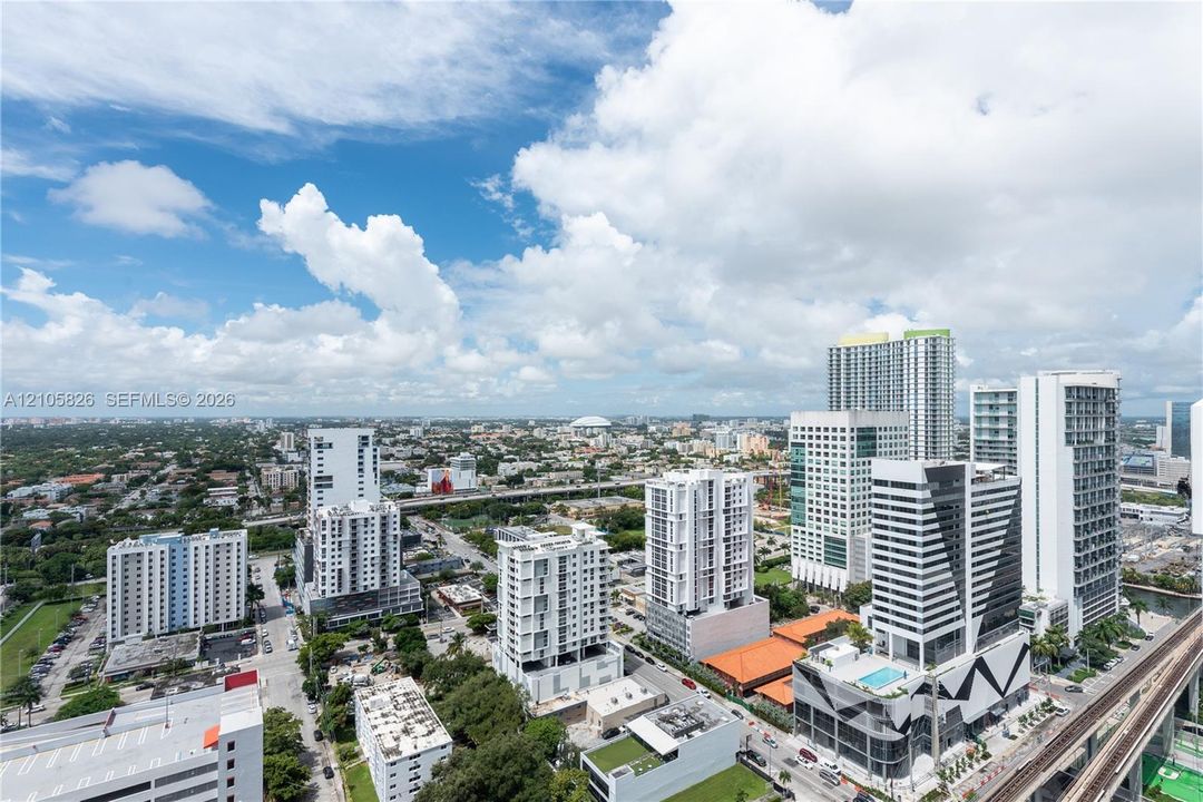Panoramic cityscape showcasing high-rise architecture and urban infrastructure