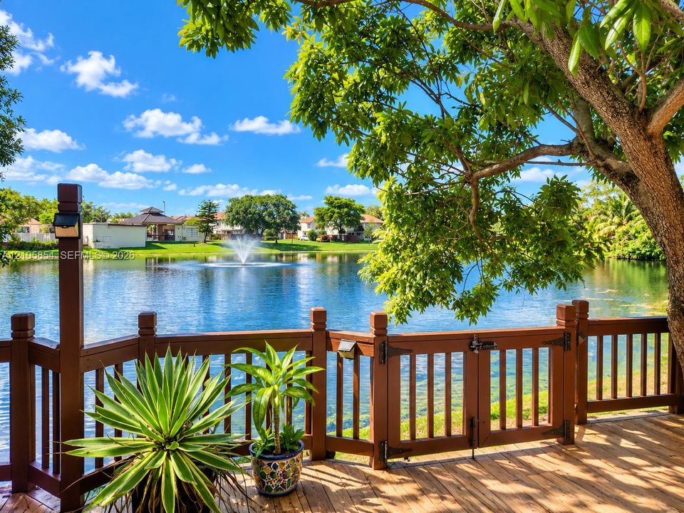 Beautiful lakefront deck, perfect for outdoor dining, entertaining, or relaxing while enjoying peaceful water views.