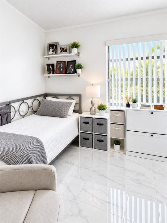 A first-floor bedroom and full bathroom provide flexibility for guests, family, or a home office