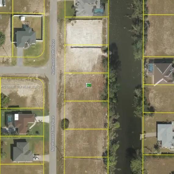 Property Survey. Aerial view outlining the parcel boundaries and geographic orientation of the property