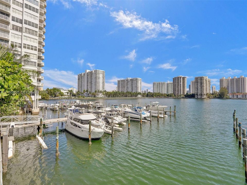 Waterfront bulkhead featuring a private boat slip, wooden pilings, and direct deep-water access