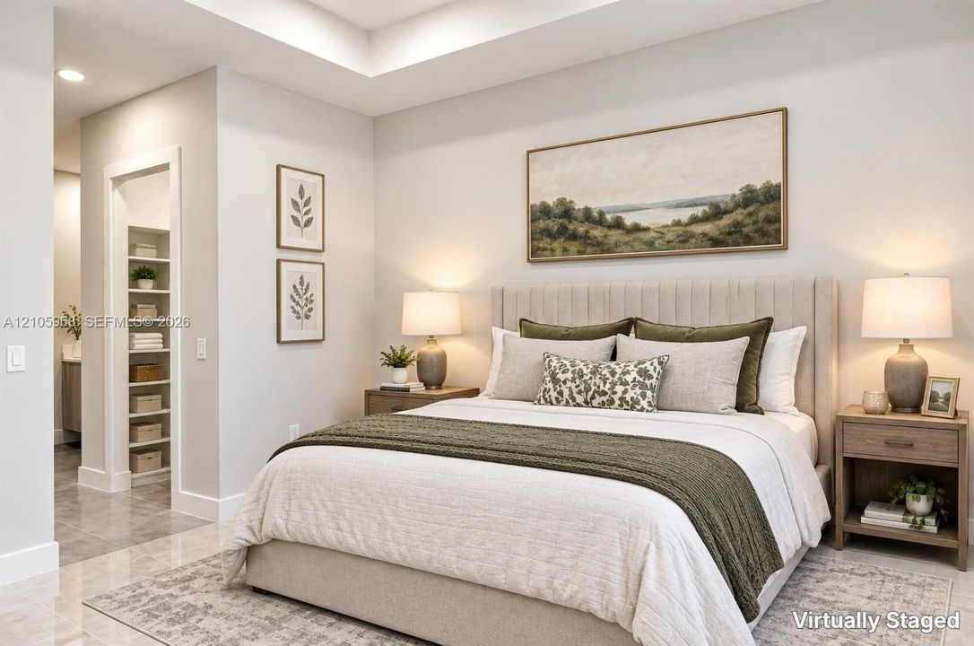 Tray ceiling, recessed lighting, and built-in shelving unit