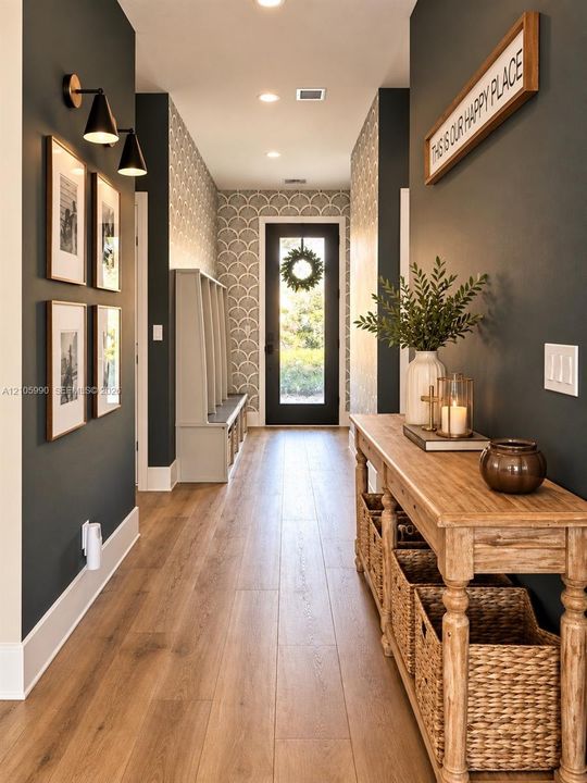 Kitchen featuring a center island with a charcoal finish, contrasting white upper cabinetry, warm-tone lower cabinetry, quartz countertops, and matte black pendant lighting
