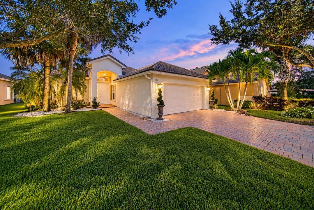 Twilight Mediterranean Home with Tropica