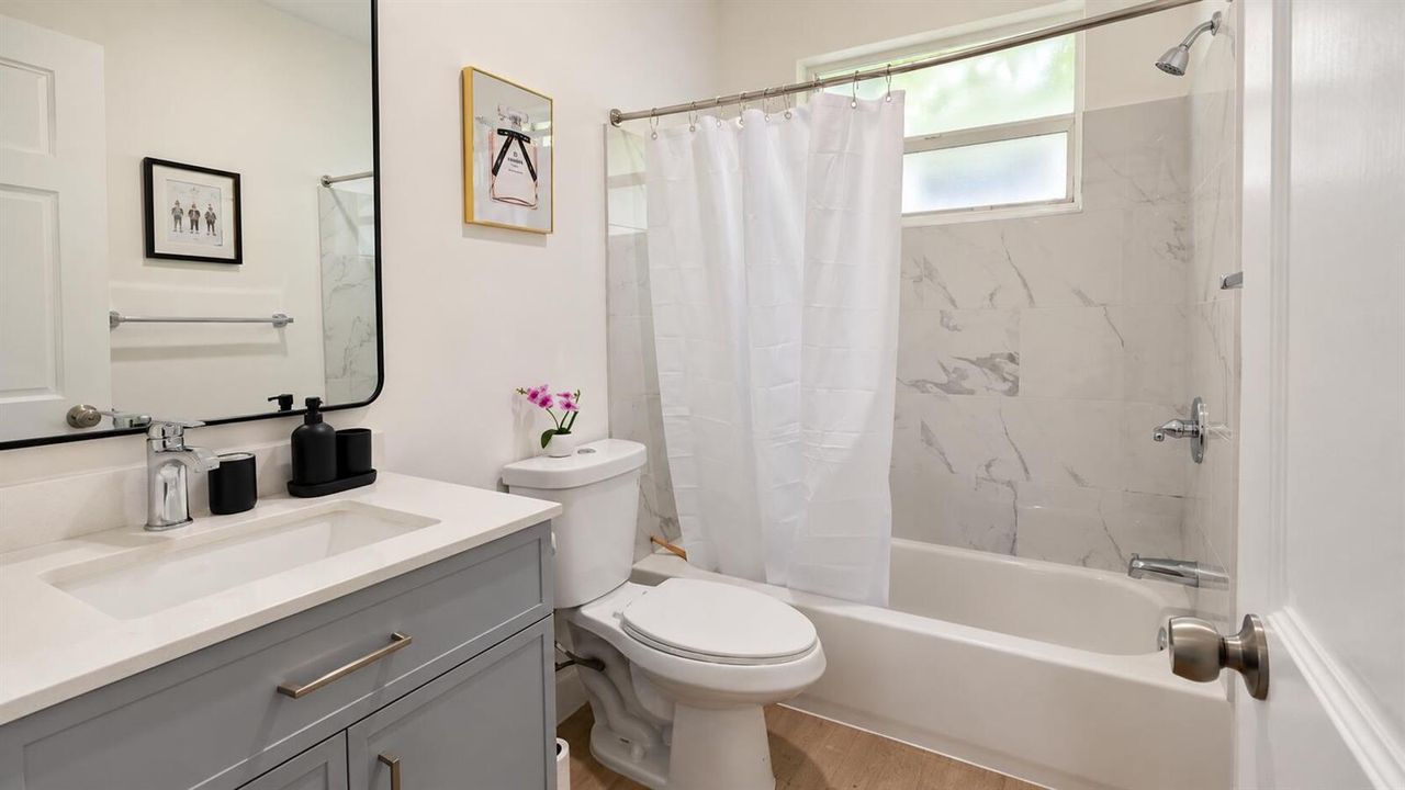 Modern Bathroom with Gray Vanity