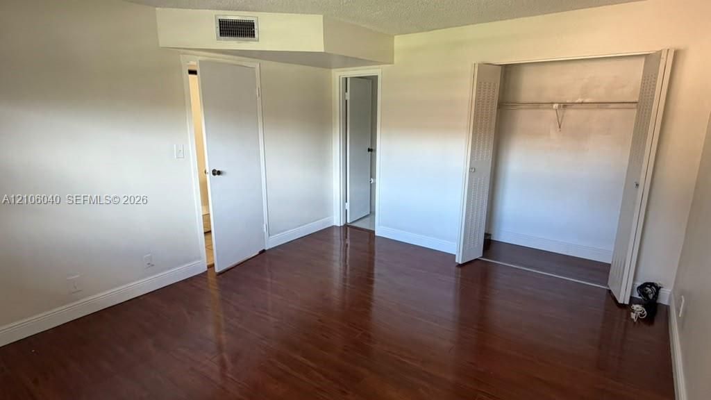 MASTER BDR with 1/2 BTH and bi-fold closet doors, and multiple interior doors