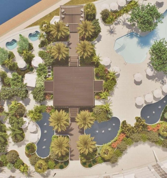 Aerial view of a sprawling recreation area featuring multiple swimming pools, integrated spas, decorative water fountains, wood-finish walkways, and mature landscaping