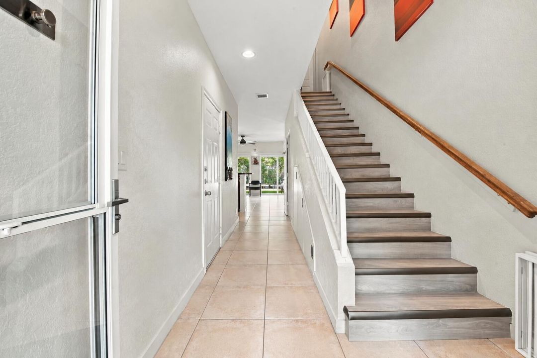 Rug-free beige tile floor
