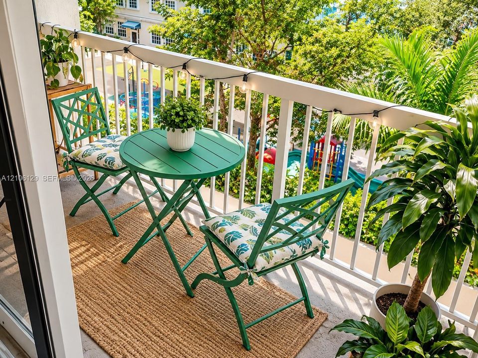 Private balcony featuring a white metal railing and concrete flooring