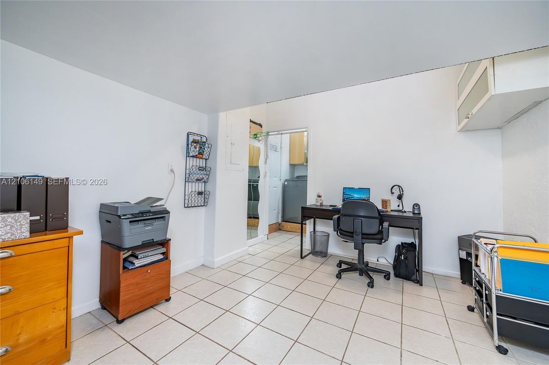 Ceramic tile flooring and high-mounted built-in cabinetry