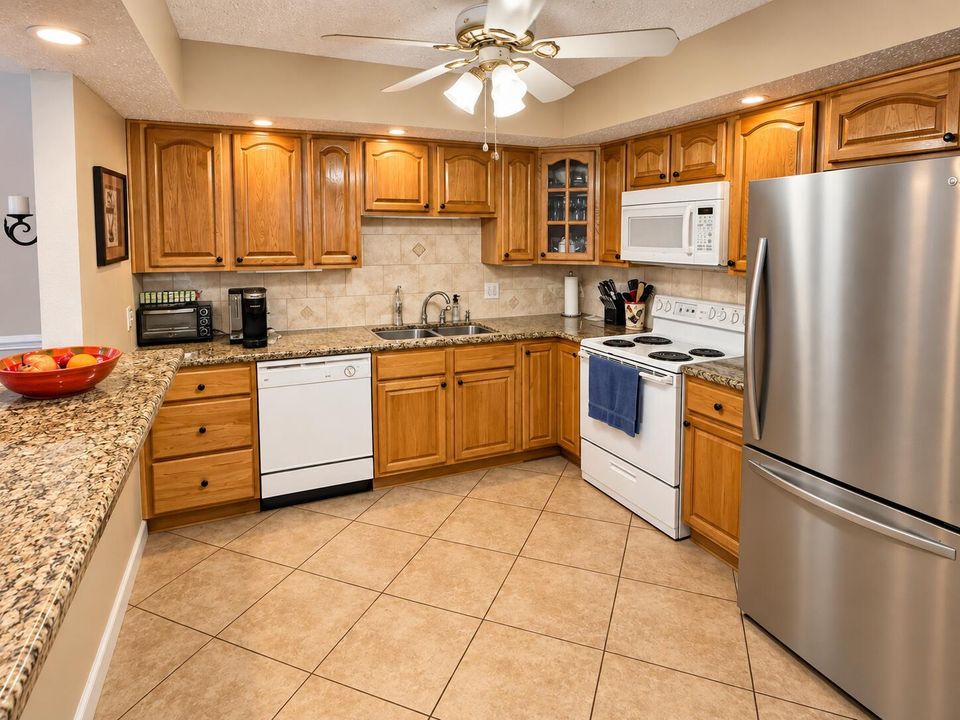 Warm Oak and Granite Kitchen Interior