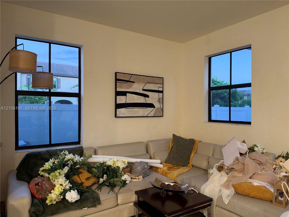 Large dual-pane windows with black frames