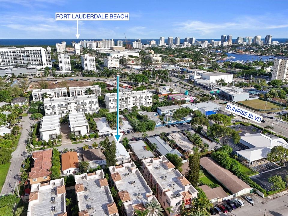 Aerial perspective showcasing property proximity to coastal landmarks and major thoroughfares