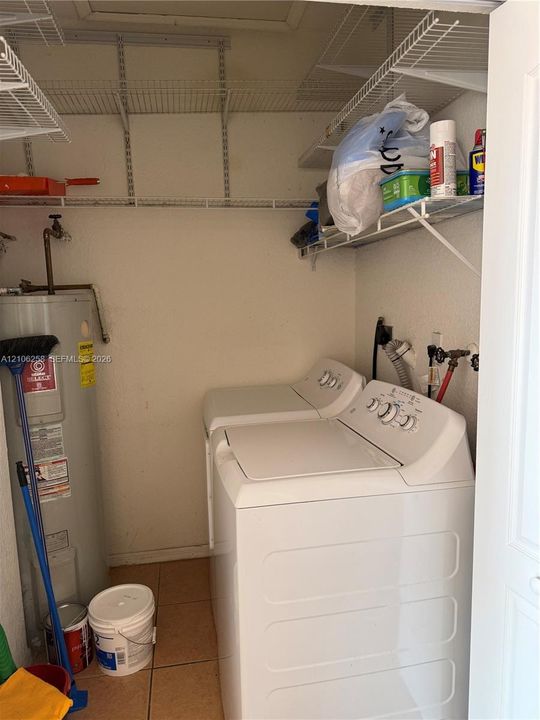 Laundry room with extra storage space.