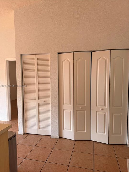 the laundry is conveniently located in front of the kitchen