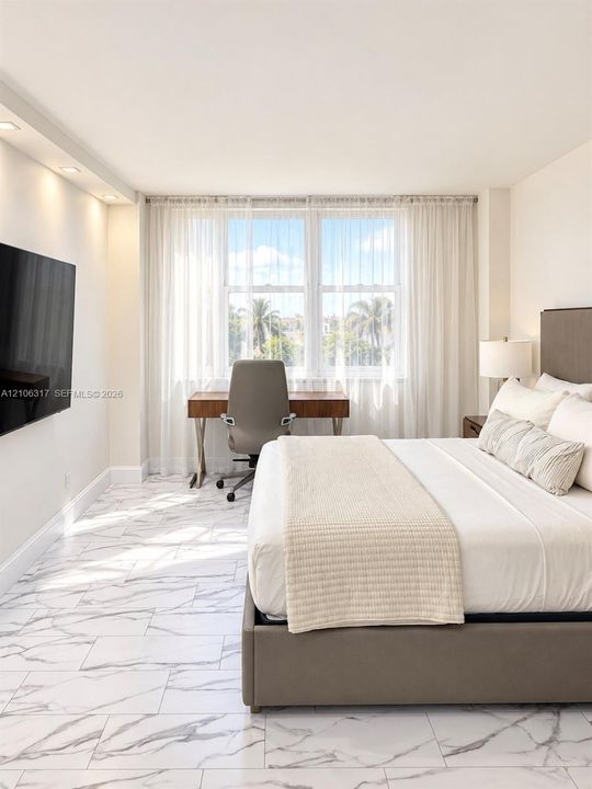 Large-format stone-style tile flooring, recessed ceiling lighting, and expansive windows