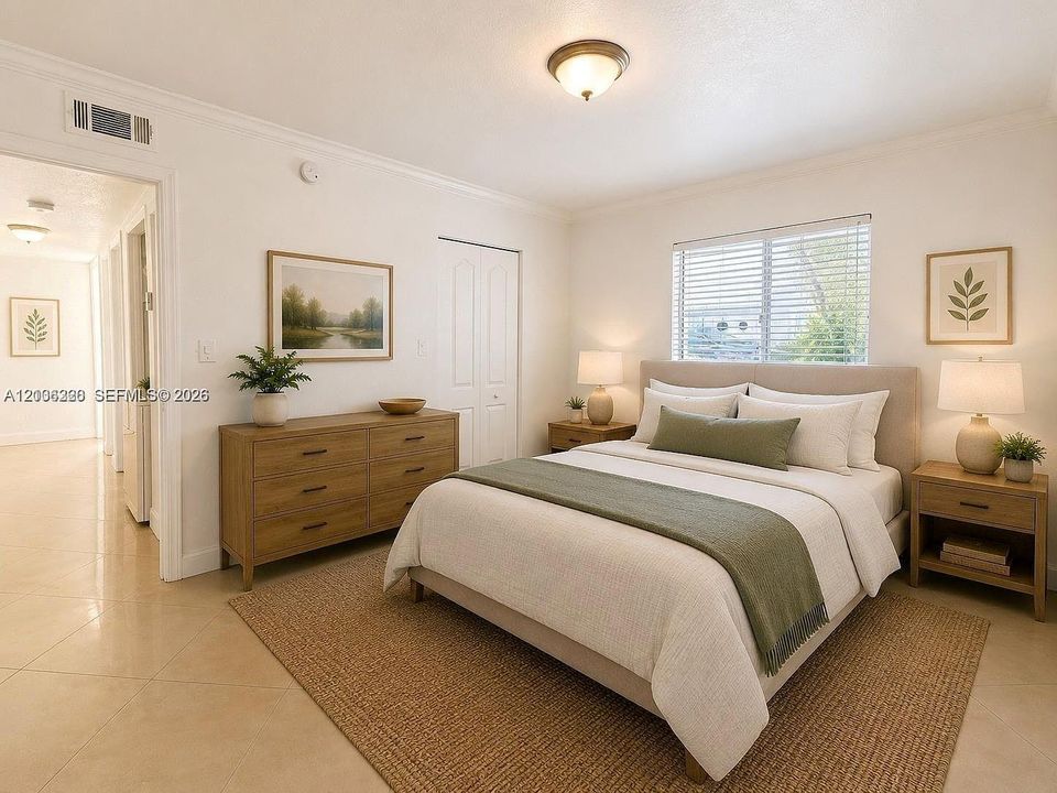 Light-toned tile flooring, neutral wall color, semi-flush mount ceiling lighting, and horizontal window blinds