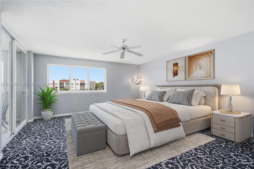 Large horizontal window, sliding glass door, white ceiling fan, and patterned textile flooring
