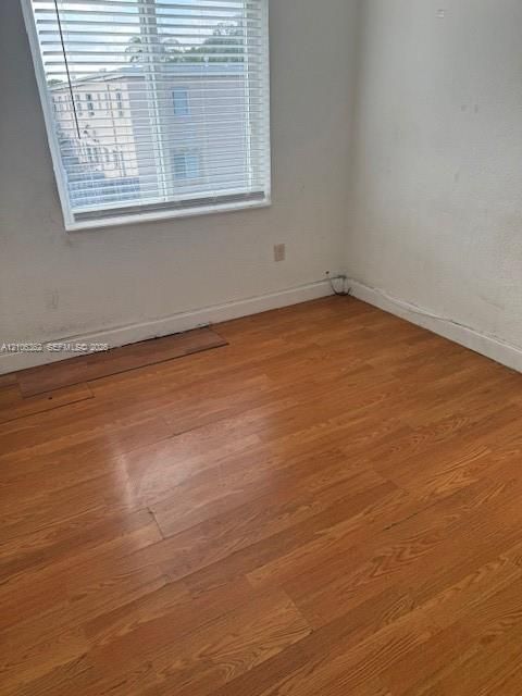 Wood-finish flooring and horizontal window blinds