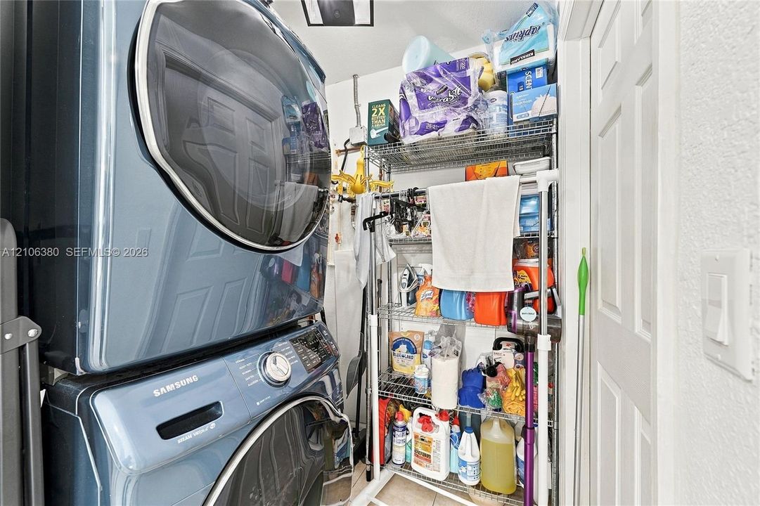 Stacked front-load laundry appliances