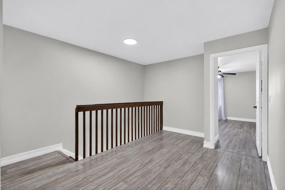 Empty loft landing with open stairwell