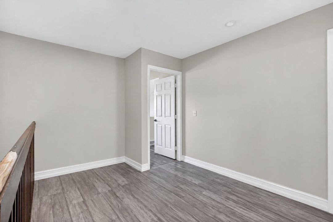 Empty loft landing with open stairwell-2