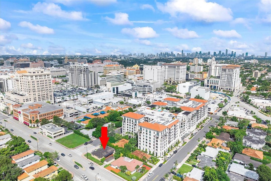 Aerial perspective of urban location featuring proximity to high-rise structures and multi-story building density