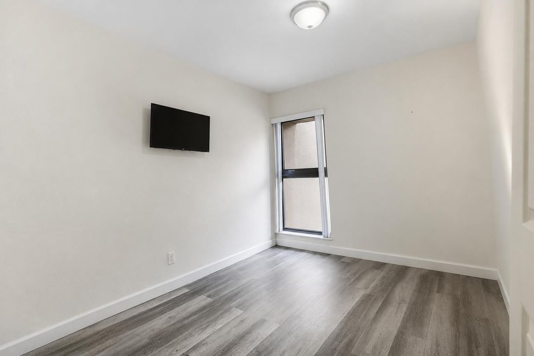 Minimalist Room with Wall-Mounted TV