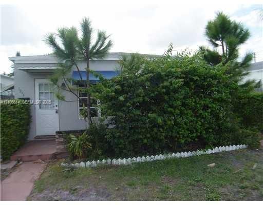Side exterior from prior 2011 listing; appearance may have changed.