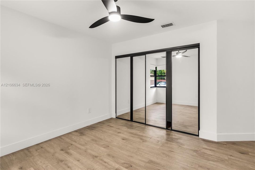 Second bedroom - mirrored closet sliding doors
