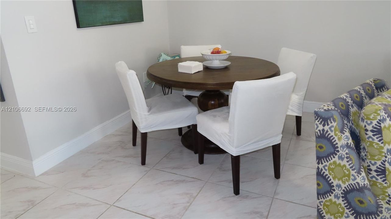 Neutral-toned large-format tile flooring