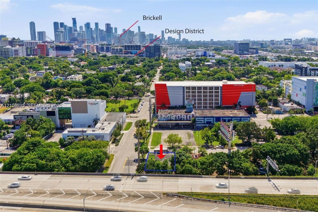 Aerial perspective of a corner lot featuring urban positioning with proximity to the Brickell and Design District skylines