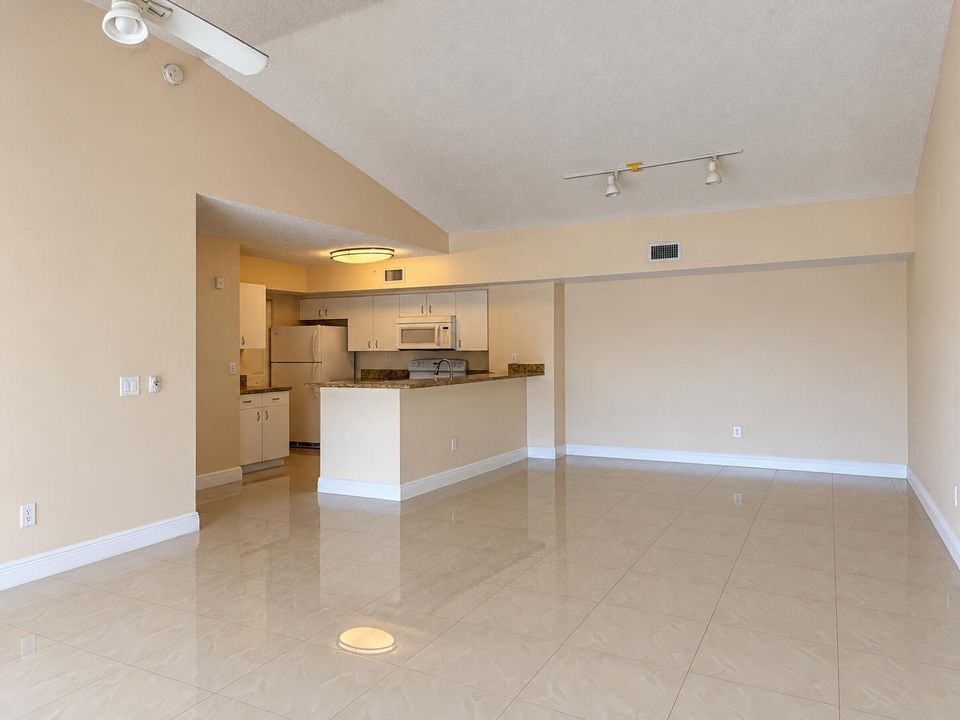 Spacious Neutral Open-Plan Kitchen and L