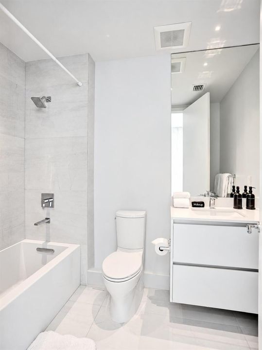 Bright Minimalist White Bathroom