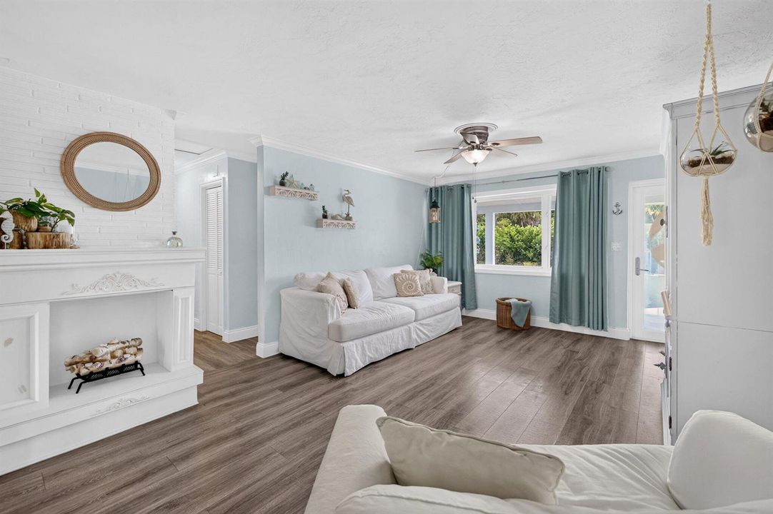 Living room with decorative fireplace