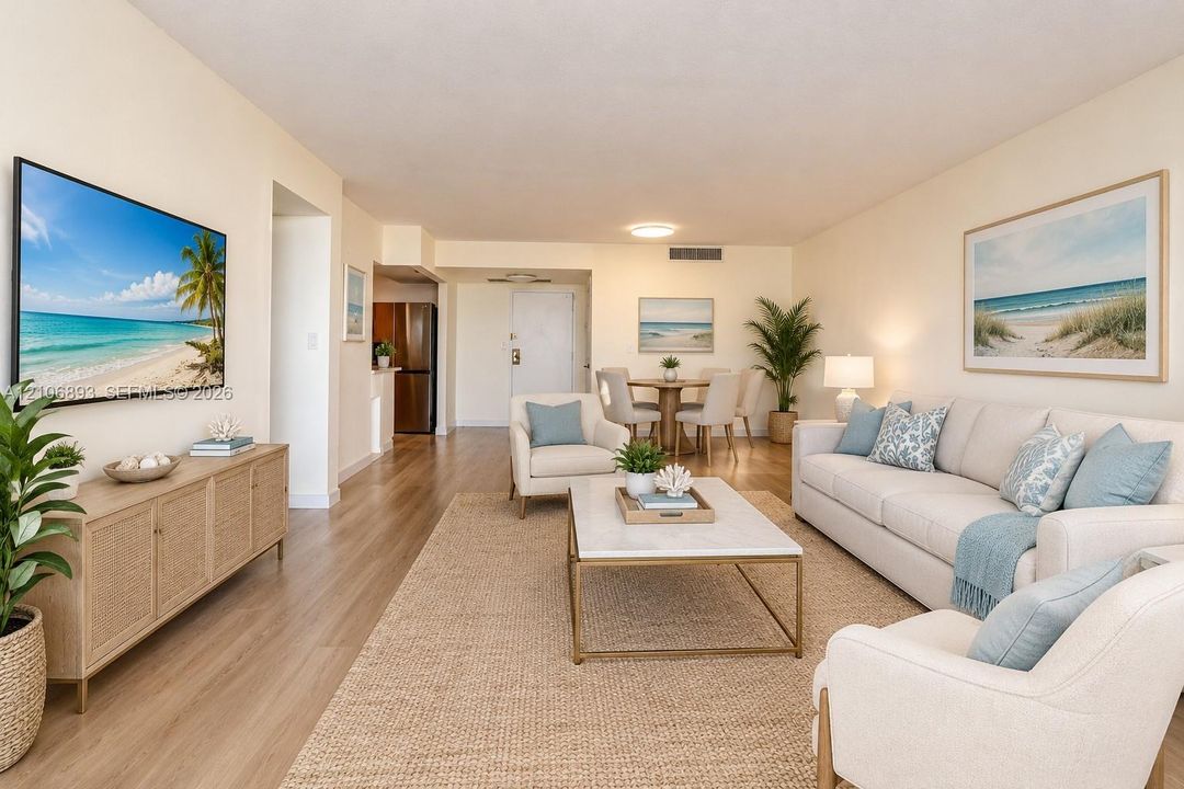 Open-concept living space featuring wood-finish flooring and recessed ceiling lighting