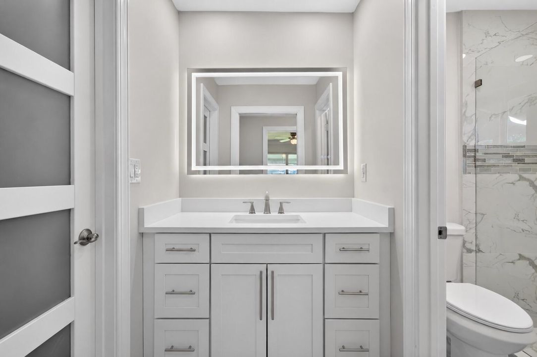 10_Bathroom_2_full_vanity_Reflection_rem