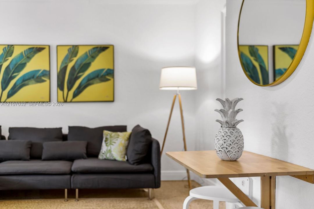 Wall-mounted, drop-leaf wooden table