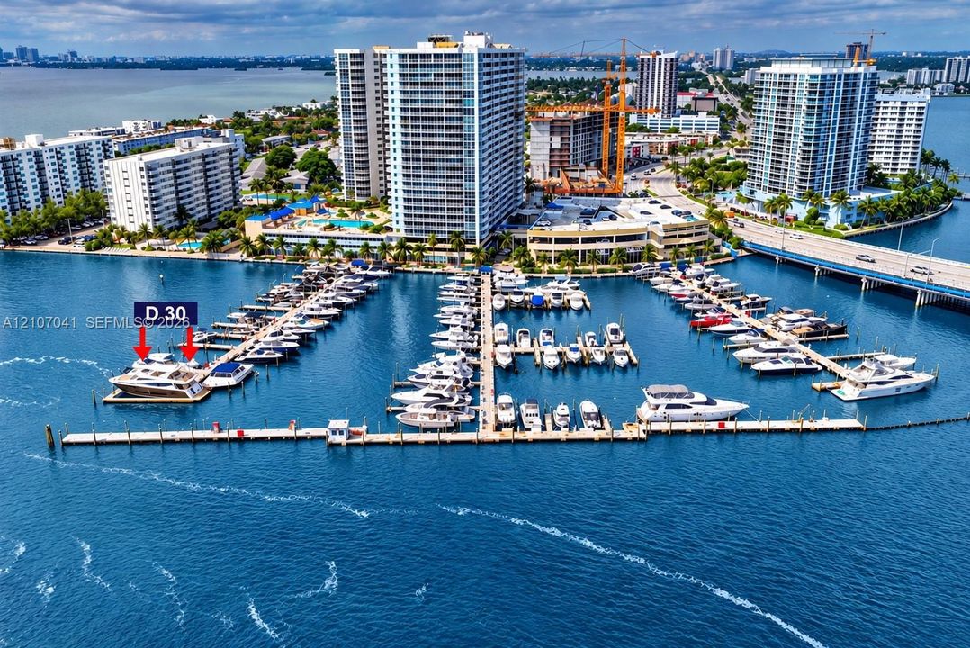 Deep-water marina slip designated as D30 featuring direct aquatic access and concrete dock construction