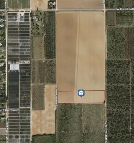 Aerial Parcel Map. Outlining the boundary and geographical coordinates of the property