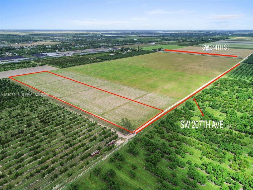 Expansive acreage featuring level, cleared land with prominent frontage on SW 207th Ave and SW 344th St