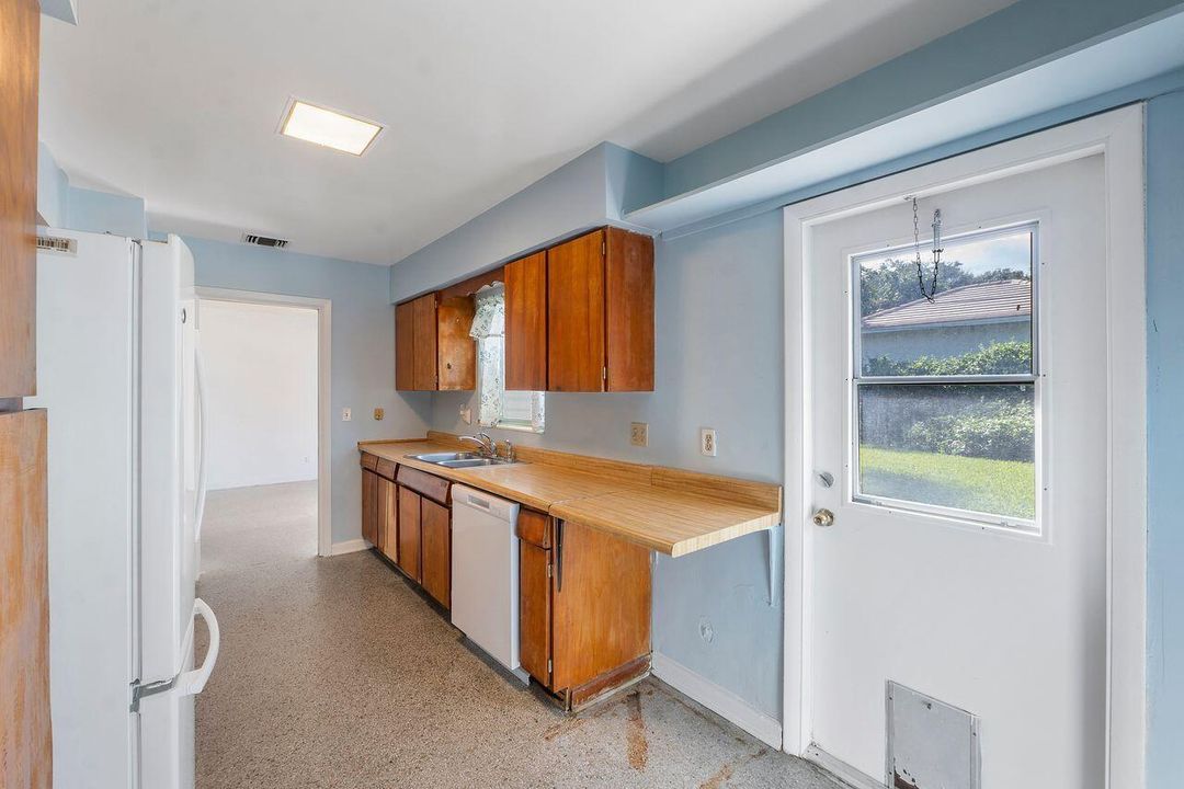 Door to Backyard off Kitchen